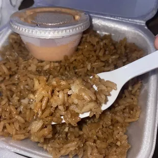 My "fried rice", extra $4 and was white rice covered in soy sauce.