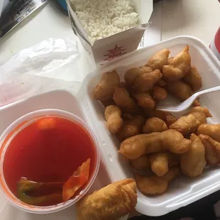 Sweet and Sour chicken, egg roll and rice