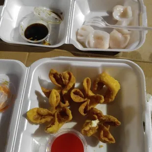 Crab rangoon and shrimp dim sums from their appetizer menu. A small hot and sour soup in the top left corner.