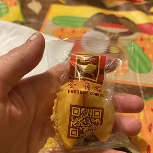 a person holding a snack