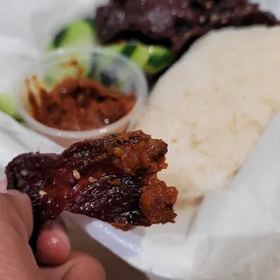 Dip the Jerky into the Jeow Bong sauce ~ the taste of sauce reminds me of a mild spiced shrimp paste ~