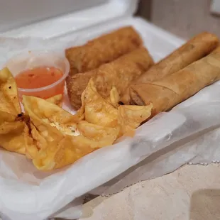 W.O.W. Sampler (2 Spring Rolls, 2 Egg Rolls, 3 Crab Rangoons) $8