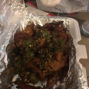 Spicy garlic wing good n when they say spicy they mean it but they got good flavor