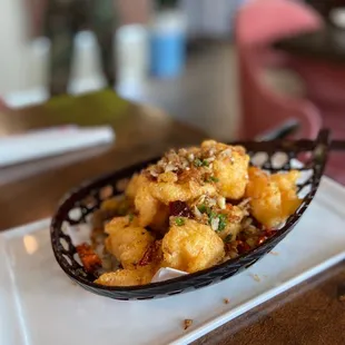 a dish of fried food on a plate