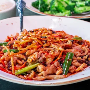 a plate of stir fried food