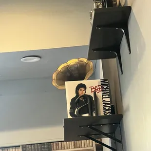 a shelf with a record on it