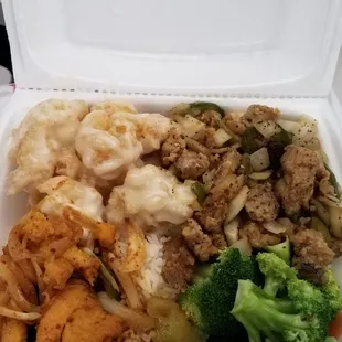 This is a huge lunch box $6.99 for 3 entrees and half rice half veggies. It took me over 5 hours to finish