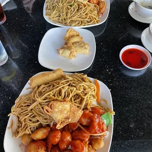 Sweet and sour chicken with lo mein and Cream cheese crab puffs