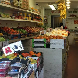 Fruits and veggies in Chinatown including the popular persimmon.