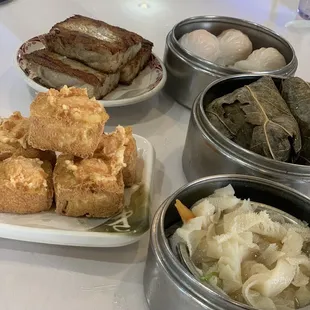 Turnip cake, stuffed fried tofu, shrimp dumplings, sticky rice, beef tripe