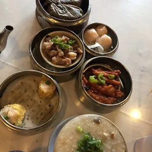 Top to bottom, left to right: sticky rice, spare ribs, crystal shrimp dumpling, seafood shumai, chicken feed, congee