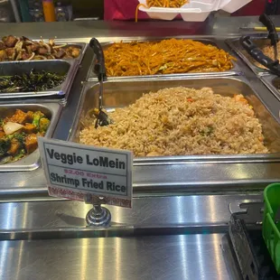 a variety of food items in a buffet