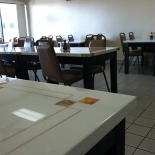 tables and chairs in a restaurant