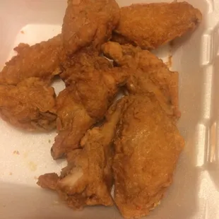 Bland, tasteless "spicy" wings.  Where's the sauce? Where's the flavor? Absolute disgust!