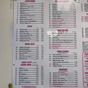 a menu on a wall in a restaurant