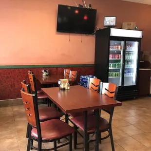 a table and chairs in a restaurant