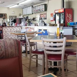 a table and chairs in a restaurant