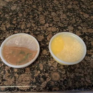 Hot and sour soup on the left an egg drop soup on the right.