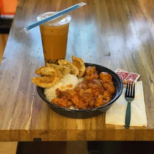 Sweet and Sour Chicken with a Side Order of Gyoza (potsticker) and Thai Iced Tea with Boba