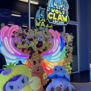 Cute claw machine arcade with winnable prizes for a fair price!