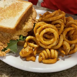 Chicken fried chicken sandwich on Texas toast (by request) and curly fries