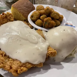 Chicken fried chicken with mashed potatoes, fried okra and corn bread! So yummy! Try the ranch, it's made in house!