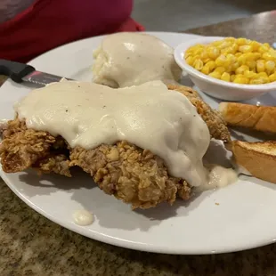 Chicken fried steak, corn, mashed potatoes and Texas toast.