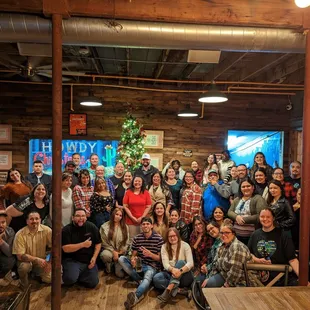 a group of people posing for a picture