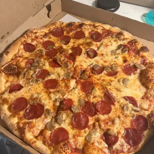 Pepperoni and sausage pizza