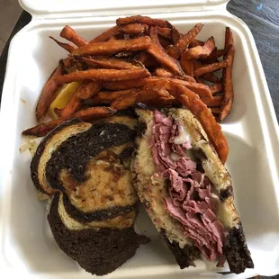 Corned beef on rye with sweet potato fries