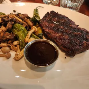 New York  steak  with mushrooms  perfect