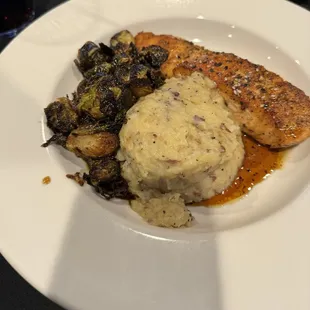 Soy Chili Glazed Salmon Soy chili glazed salmon, mashed potatoes, glazed brussel sprouts, sesame seeds, sliced green onion