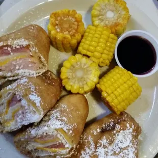 The magnificent (and delicious!) Monte Christo sandwich. The dipping sauce shown here is the raspberry. The corn is amazingly seasoned.