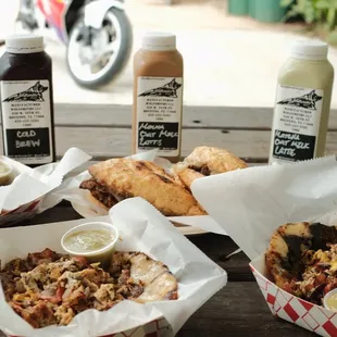 a variety of food items on a picnic table