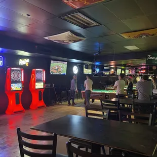 a game room with arcade machines