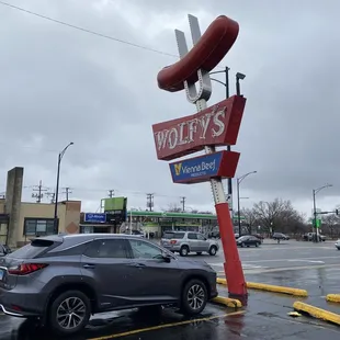 a hot dog on a sign