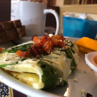 Tomato Spinach Feta Omelette. Cooked perfectly
