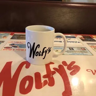 Hot coffee just patiently waiting for his breakfast friends and guess what, So am I! Love the old school tables supporting local businesses