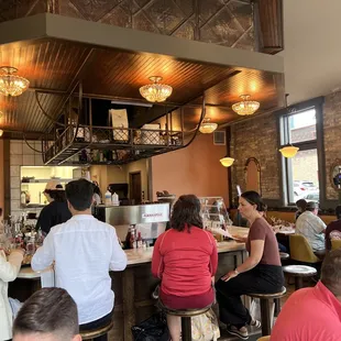 people sitting at the bar