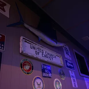 a variety of signs on the wall