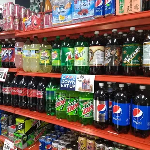 a variety of sodas and soft drinks