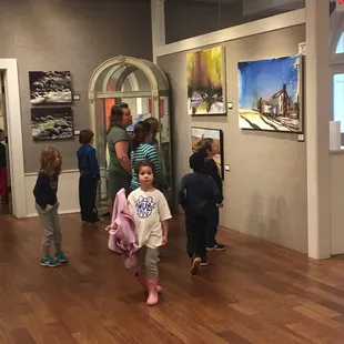 Students checking out the art in the gallery