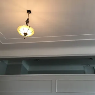The mezzanine and vintage chandelier