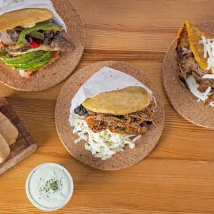 Cachapas, Monster Arepas, tequeños and more. Best cilantro and garlic sauce