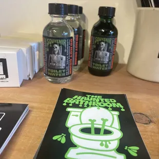 Haunted toilet water and merch.