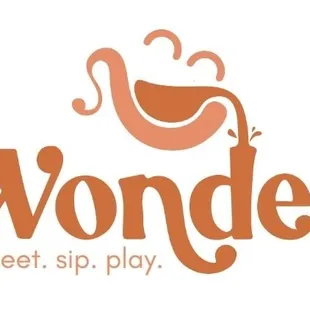 a cup of coffee with the word wonder on it