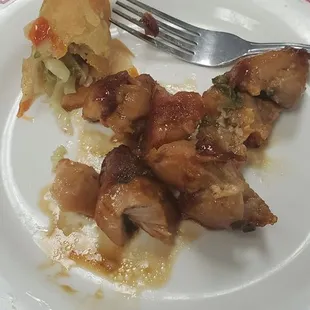 Foil wrapped chicken and half of egg roll