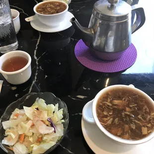 Hot tea, hot &amp; sour soup, and salad