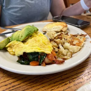 an omelet with a side of vegetables