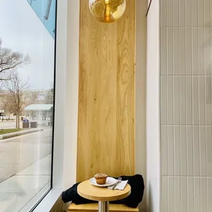 Awesome large windows in most of the space. Tables and seats are on the smaller size.